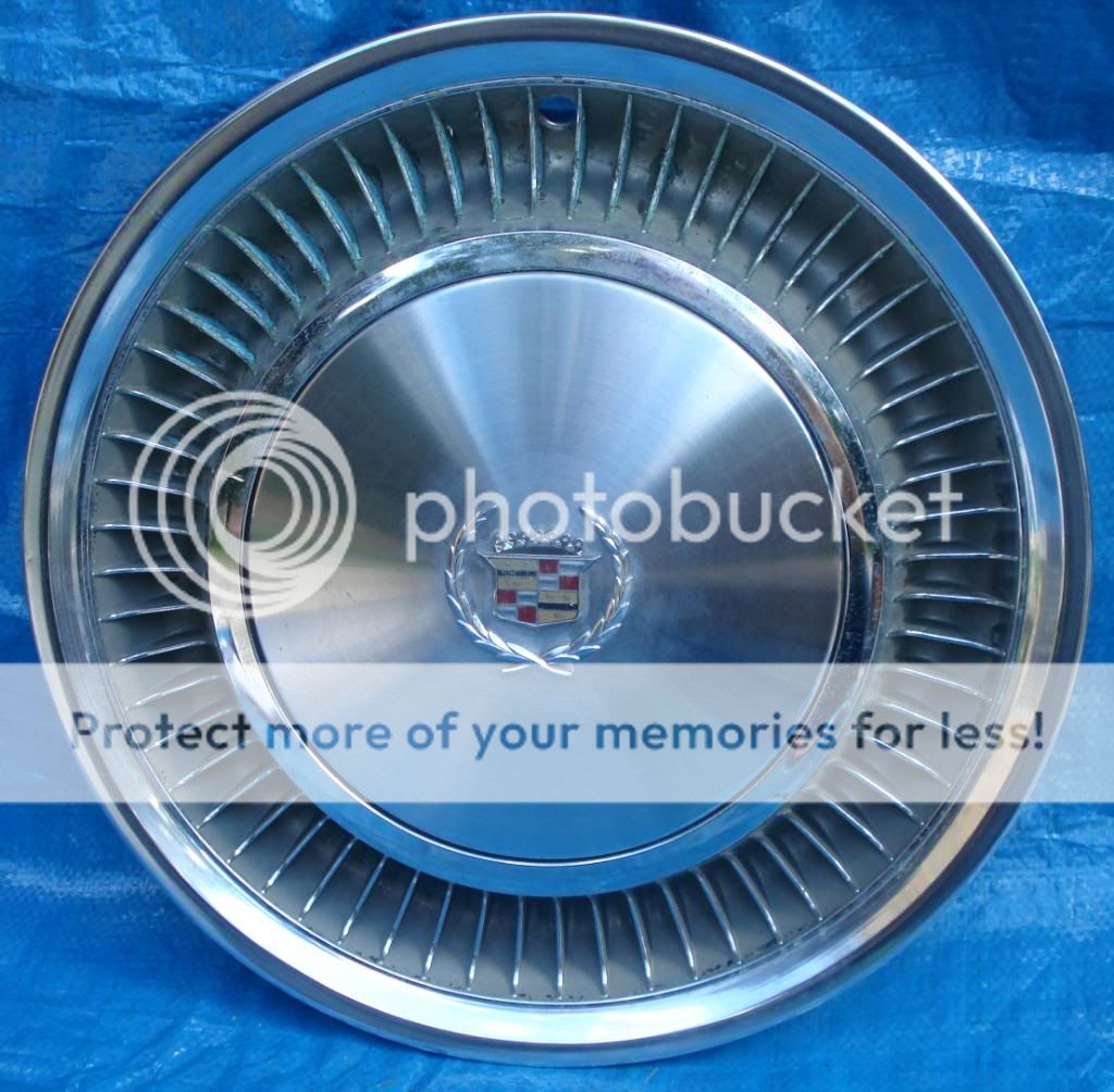 anything special about these hubcaps ?? | Cadillac Owners Forum
